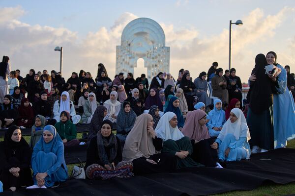 Muslim worshippers gather for Eid al-Fitr prayer in the mixed Arab Jewish city of Jaffa, near Tel Aviv, Israel, Sunday, March 30, 2025. (AP Photo/Ohad Zwigenberg)