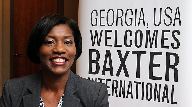 JULY 26, 2012-ATLANTA: Portrait of Carol Henderson at the Georgia Economic Development office in the Centergy One building in Atlanta on Thursday July 26th, 2012. She helped lure Baxter International, one of the biggest economic coups, to Georgia over rival North Carolina and others. For story focusing on the behind-the-scenes work, secretive meetings and long hours that go into landing the big fish. They didn't call it Project Marathon for nothing. Baxter International's decision to build a massive manufacturing plant in Georgia was more than four years in the making, a long-running courtship that involved mysterious requests from middlemen, hastily-arranged visits, an aggressive incentives package and a final heart-to-heart with the governor to seal the deal. And above all, it took tenacity, flexibility and a seemingly limitless reservoir of patience. PHIL SKINNER / PSKINNER@AJC.COM