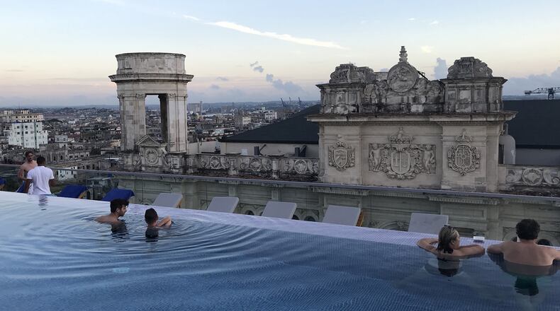 The rooftop pool of the new Gran Hotel Manzana Kempinski, which opened last summer, overlooks Havana. The hotel landed on the U.S. government’s list of banned businesses in November, but Backroads customers are allowed to stay here because the company booked the rooms before the list came out. (Lori Rackl/Chicago Tribune/TNS)