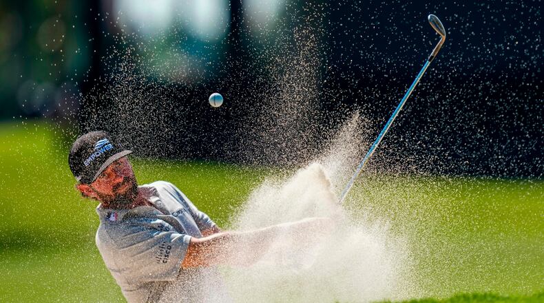 Cameron Young hits from the bunker on the eighth green during the second round of the Cadillac Championship PGA golf tournament Friday, May 1, 2026, in Doral, Fla. (AP Photo/David J. Phillip)