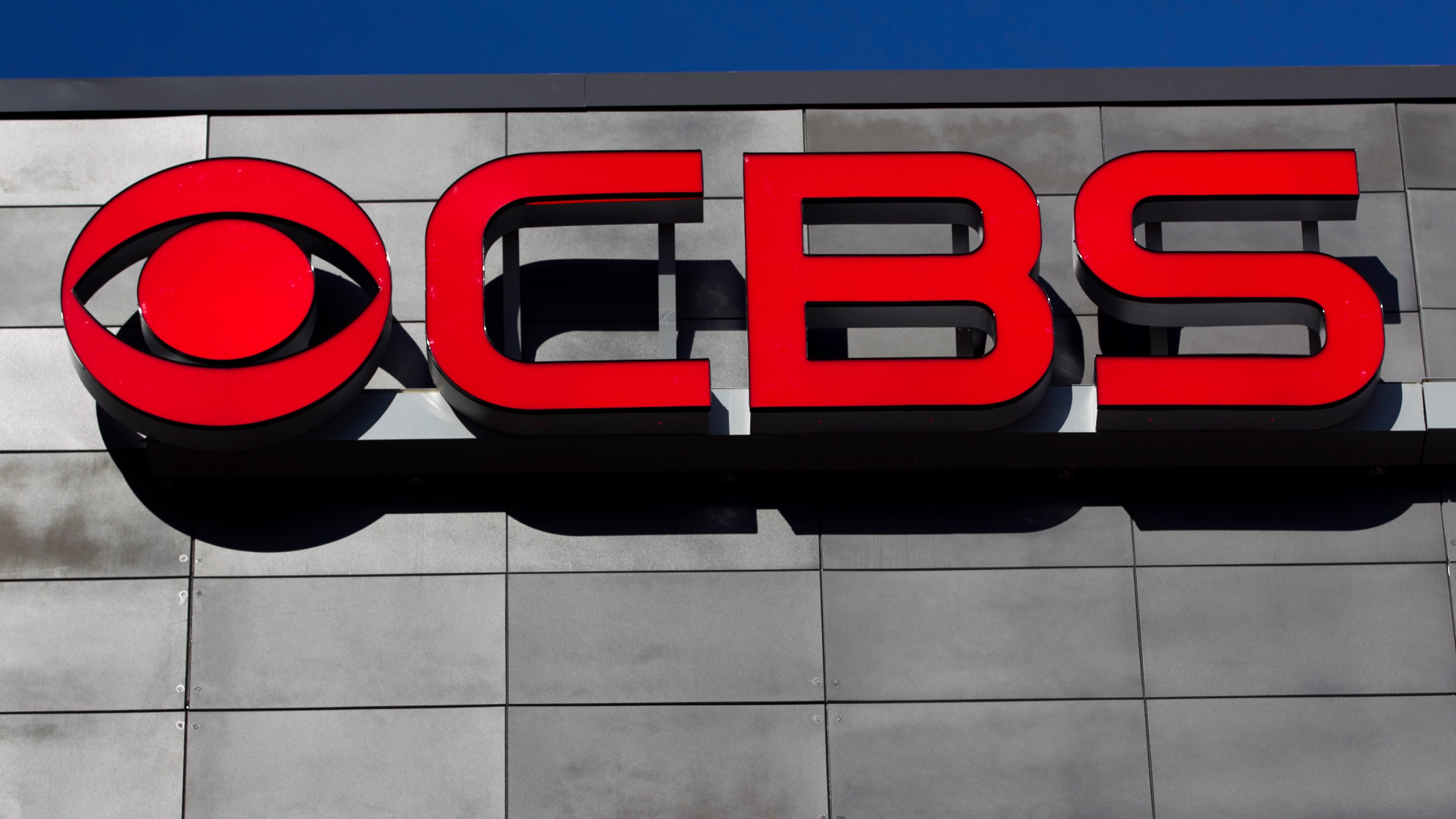 FILE - The CBS logo is displayed on the exterior of CBS Scene Restaurant and Bar, at Gillette Stadium, in Foxborough, Mass., Feb. 13, 2012. (AP Photo/Steven Senne, File)