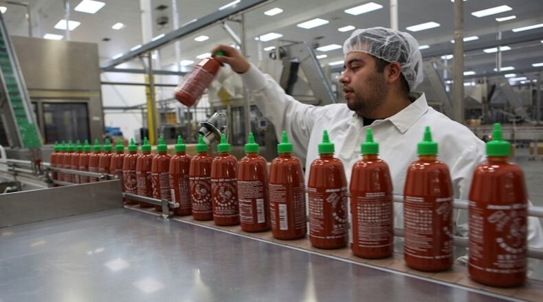 Many food words, including Sriracha, have been added to the Merriam-Websters online dictinoary. (Irfan Khan/Los Angeles Times/TNS)