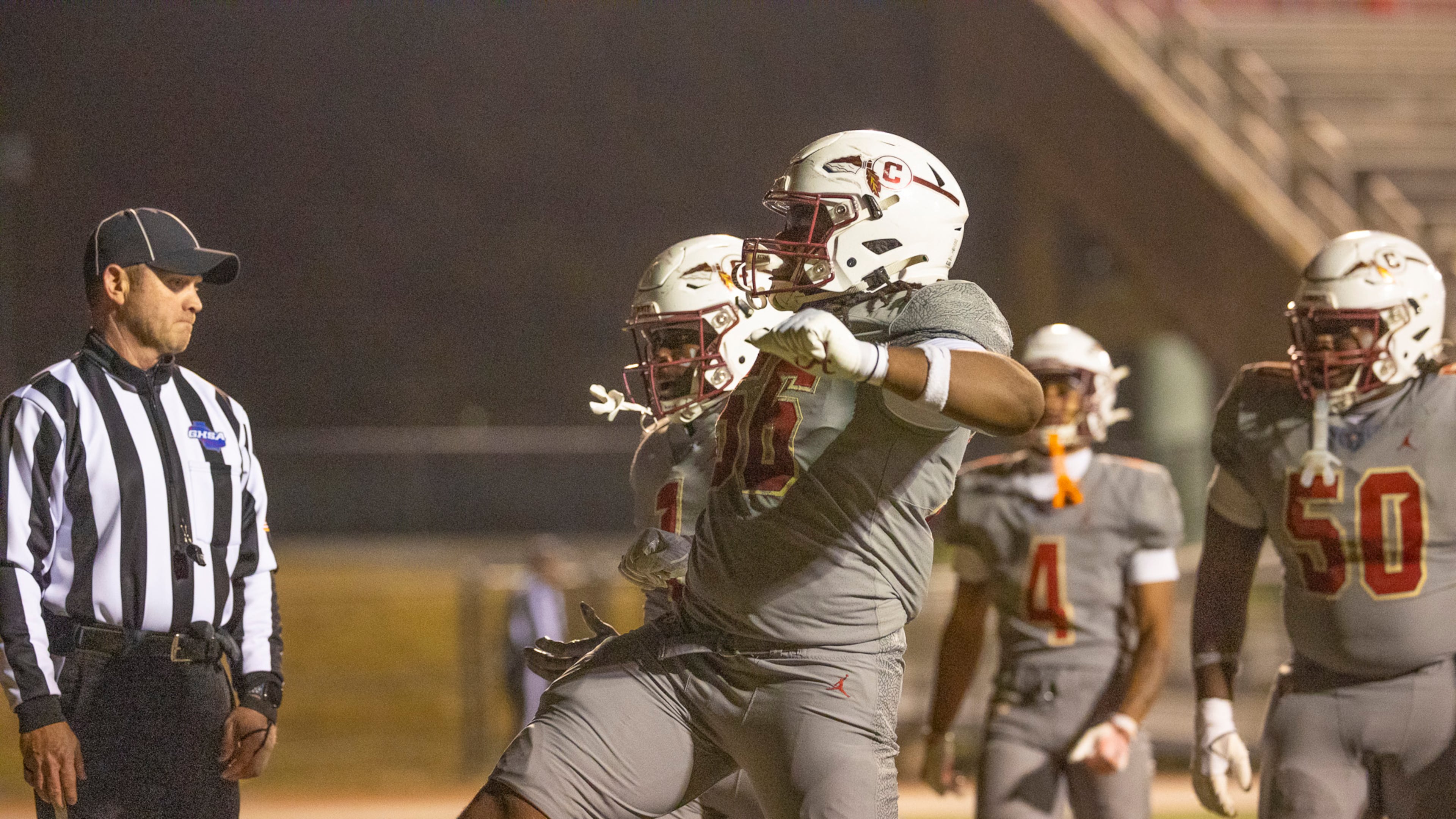 Creekside runing back Gary Walker (1) celebrates the game-winning touchdown with teammate Lawrence Martin II (56) during the second half of the class 4A semifinal against Kell at Creekside High School in Fairburn, GA on Friday, December 5, 2025. (Oscar Guevara Saenz for the AJC)