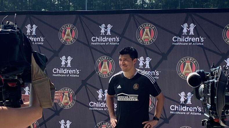 Atlanta United manager Gonzalo Pineda is interviewed by journalists after his first day of running training for the MLS team in Marietta, Ga. on August 24, 2021.