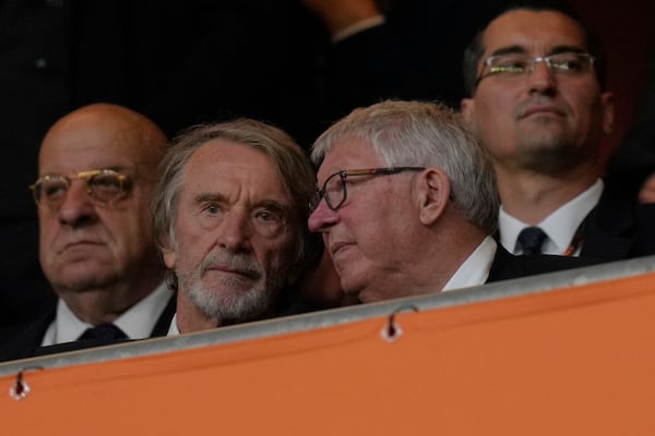 Sir Alex Ferguson, right, speaks to Sir Jim Ratcliffe during the Europa League final soccer match between Tottenham Hotspur and Manchester United at the San Mames Stadium in Bilbao, Spain, Wednesday, May 21, 2025. (AP Photo/Bernat Armangue)