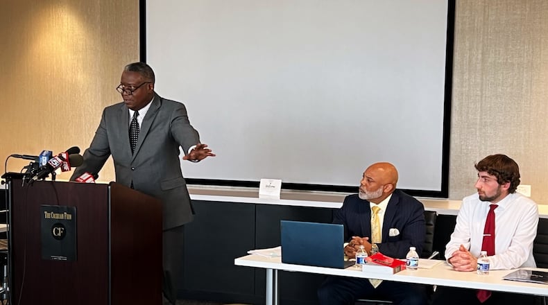Civil rights attorney Sam Starks (left), criminal defense attorney Torris Butterfield (center) and Tyler Canaris at a news conference announcing their intention to file a civil rights complaint against the Paulding County Sheriff's Office.