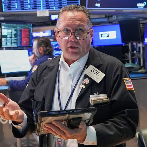 Trader Edward Curran works on the floor of the New York Stock Exchange, Friday, June 26, 2026. (AP Photo/Richard Drew)