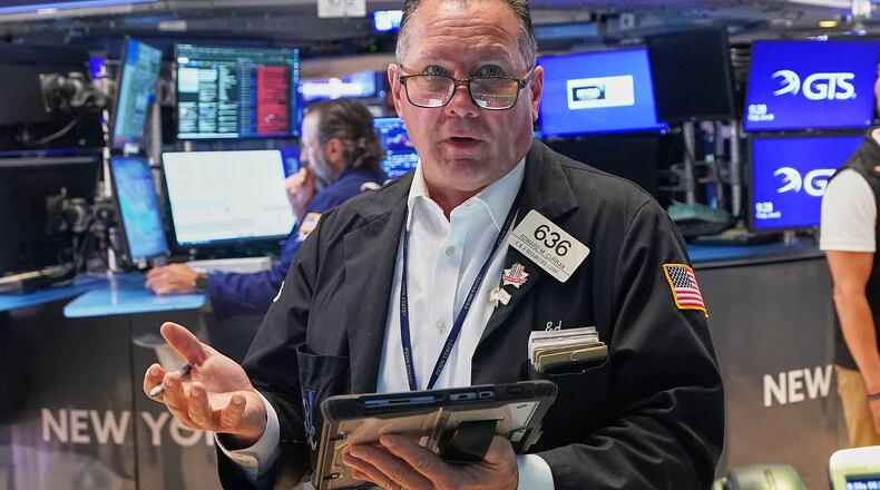 Trader Edward Curran works on the floor of the New York Stock Exchange, Friday, June 26, 2026. (AP Photo/Richard Drew)