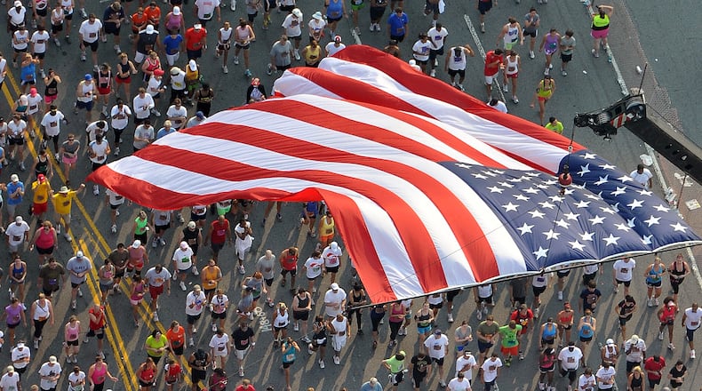 110704 Atlanta: Start line of the AJC Peachtree Road Race Monday July 4, 2011. More than$110,000 in prize was up for grabs in the 42nd running of the AJC Peachtree Road Race Monday July 4, 2011. More than 60,000 took part in the race. Brant Sanderlin bsanderlin@ajc.com