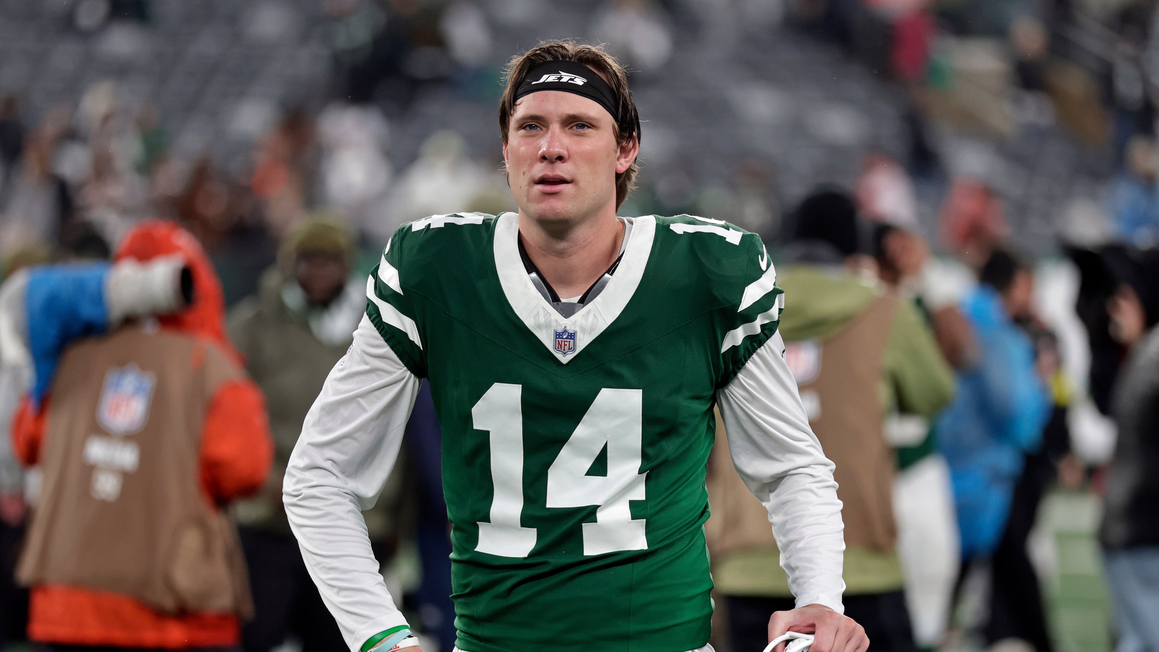 FILE - New York Jets punter Austin McNamara (14) walks off the field after an NFL football game against the Cleveland Browns, Nov. 9, 2025, in East Rutherford, N.J. (AP Photo/Adam Hunger, File)