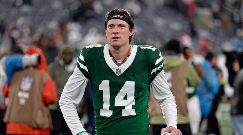 FILE - New York Jets punter Austin McNamara (14) walks off the field after an NFL football game against the Cleveland Browns, Nov. 9, 2025, in East Rutherford, N.J. (AP Photo/Adam Hunger, File)
