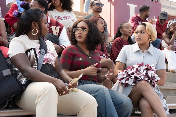 The second episode of "A Different World" features a football game set at B.T. Harvey Stadium at Morehouse College.  (From left) Alijah Kai as Rashida, Maleah Joi Moon as Deborah, Kennedi Reece as Hazel. (Daniel Delgado Jr/Courtesy of Netflix)