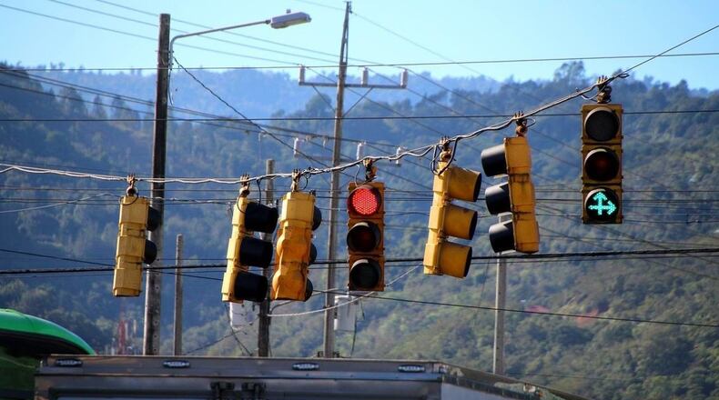 A string of traffic lights fell onto a car stopped at an Alabama intersection Friday.