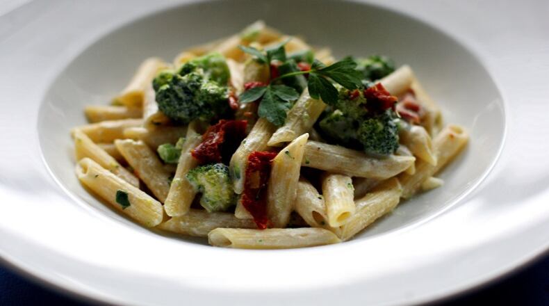 Short pasta, like the penne in this Penne with Broccoli, Sun-dried Tomatoes and Dijon Cream dish, is easier to measure than long pasta but it's easy enough to figure out. (Kimberly P. Mitchell/Detroit Free Press/TNS)