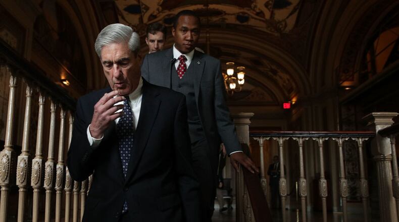 Special counsel Robert Mueller (L) arrives at the U.S. Capitol for closed meeting with members of the Senate Judiciary Committee June 21, 2017 in Washington, DC.  (Photo by Alex Wong/Getty Images)