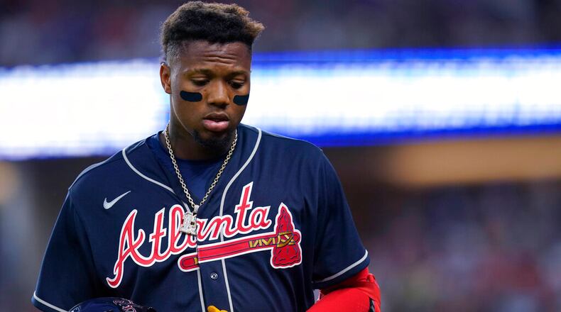 Braves star Ronald Acuna was in the lineup Monday night against the Mets. The Braves will evaluate the outfielder daily. The plan could change based on how he feels. (AP Photo/LM Otero)
