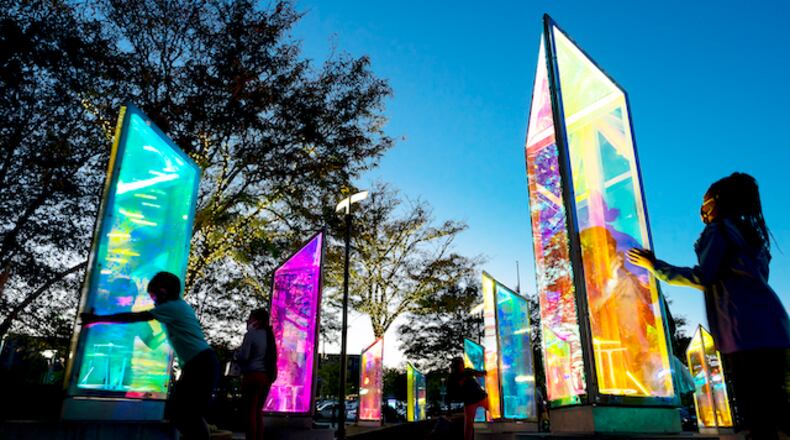 The traveling outdoor exhibit "Prismatica in the Park" (shown here while on view in Columbia, Maryland) is now at Woodruff Park downtown. It's free and open to the public through March 17.