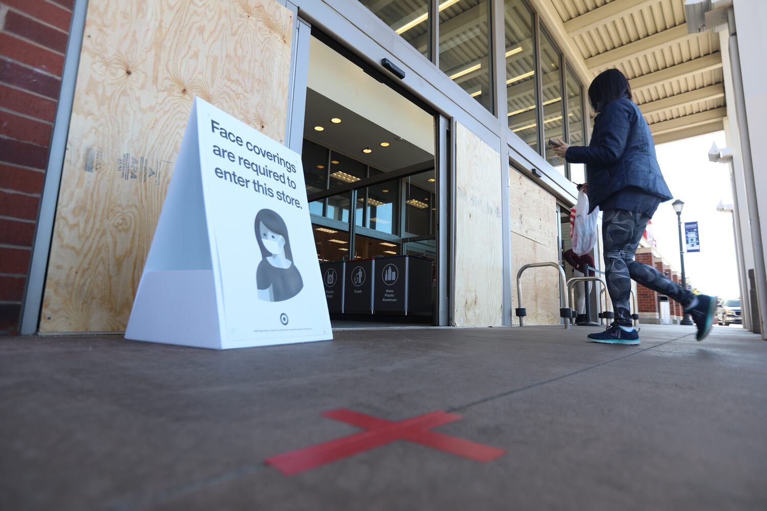 A Target Store on Edgewood Retail Center protected the entrance and windows with plywood. Business around town are boarding up windows amid fears of unrest  related to the elections on Tuesday, Nov. 3, 2020, 
Miguel Martinez for The Atlanta Journal-Constitution