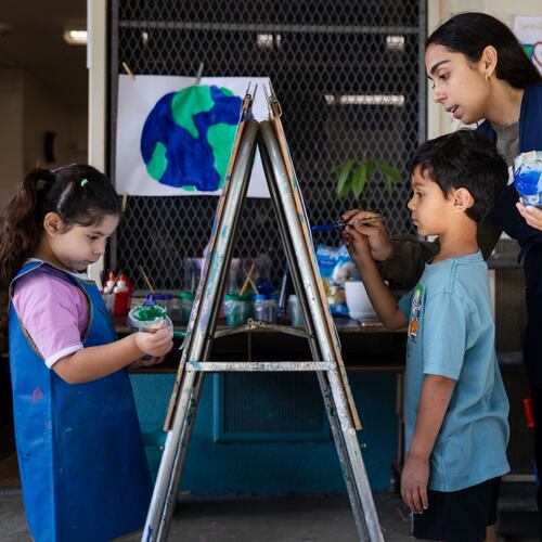 Students paint during a TK class at First Street Elementary School in Los Angeles, on Wednesday, April 22, 2026. (AP Photo/Ethan Swope)