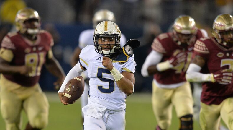 October 24, 2015 Atlanta: Georgia Tech Yellow Jackets quarterback Justin Thomas in route to a touchdown late in the first half against the Florida State Seminoles Saturday October 24, 2015. BRANT SANDERLIN/BSANDERLIN@AJC.COM