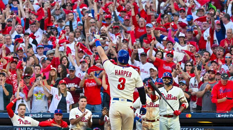 Philadelphia Phillies designated hitter Bryce Harper (3) celebrates a solo home run against the Atlanta Braves during the eighth inning of game four of the National League Division Series at Citizens Bank Park in Philadelphia on Saturday, October 15, 2022. (Hyosub Shin / Hyosub.Shin@ajc.com)