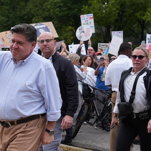 Illinois Gov. JB Pritzker, arrives during a "No Kings" protest Saturday, Oct. 18, 2025, in Chicago. (AP Photo/Nam Y. Huh)