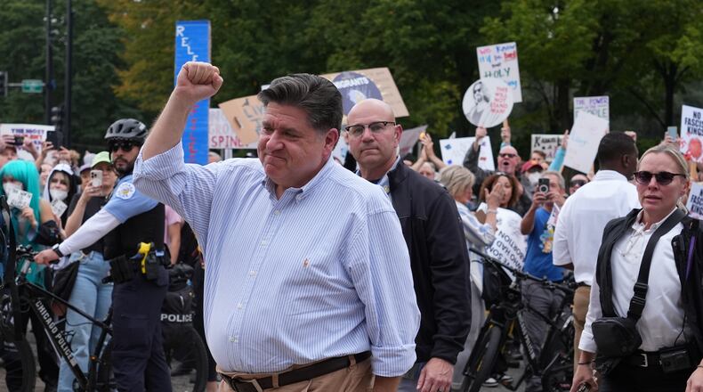 Illinois Gov. JB Pritzker, arrives during a "No Kings" protest Saturday, Oct. 18, 2025, in Chicago. (AP Photo/Nam Y. Huh)