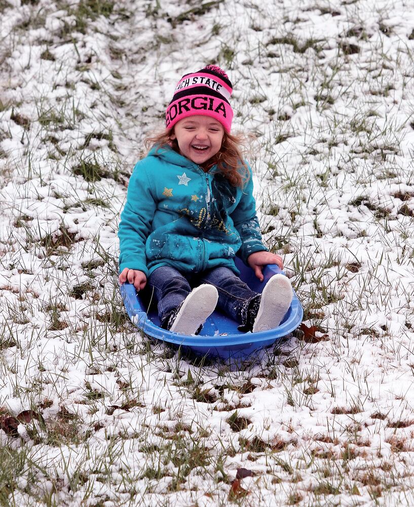 Photos: Winter storm blankets South in snow, ice