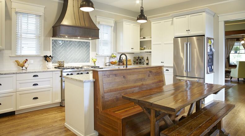 Much effort went into preserving the history of a home in Atlanta’s Virginia-Highland neighborhood while Red Level Renovations updated it in 2015. Woodwork and flooring were restored, and this breakfast nook bench was made from wood reclaimed from the renovation. CONTRIBUTED BY: Craig Bromley