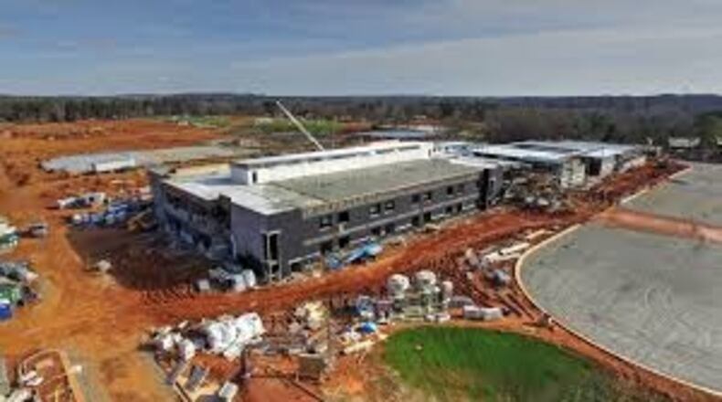An aerial view of Denmark High school, which is under construction. School board members approved a redistricting plan this week aimed at populating the school when it opens in the fall of 2018. Forsyth County Schools