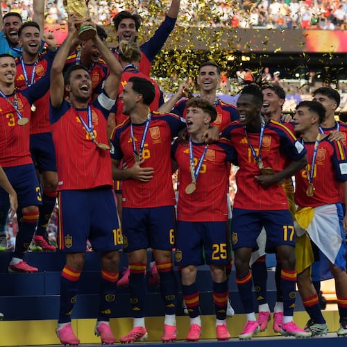 Spain players, from left, cheer alongside President Donald Trump and FIFA President Gianni Infantino at the conclusion of the World Cup championship final soccer match between Spain and Argentina in East Rutherford, N.J., Sunday, July 19, 2026. (AP Photo/Jacquelyn Martin)