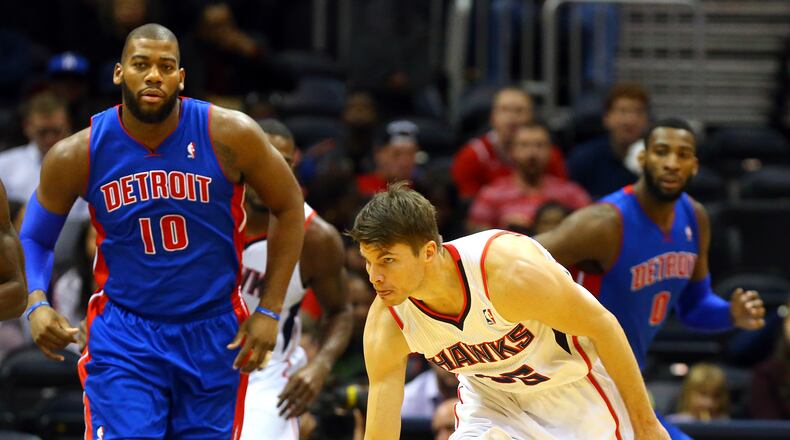 Hawks Kyle Korver gets a turnover against Pistons Greg Monroe during the first half of their NBA basketball game on Wednesday, Nov. 20, 2013, in Atlanta.