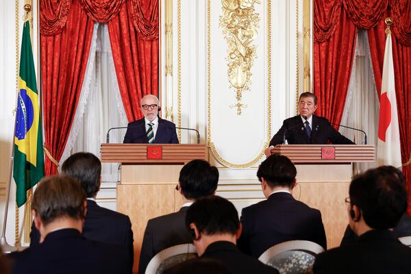 Brazilian President Luiz Inacio Lula da Silva, left, and Japanese Prime Minister Shigeru Ishiba speak during a joint press conference at the Akasaka Palace State Guest House in Tokyo, Wednesday, March 26, 2025. (Rodrigo Reyes Marin/Pool Photo via AP)