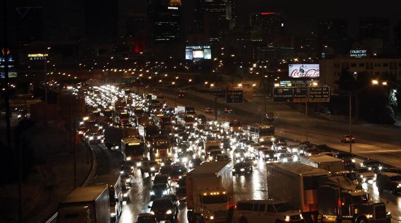 Early darkness commutes have seen more delays in the 6 p.m. hour than normal, with trip times in many areas actually increasing. AJC file photo