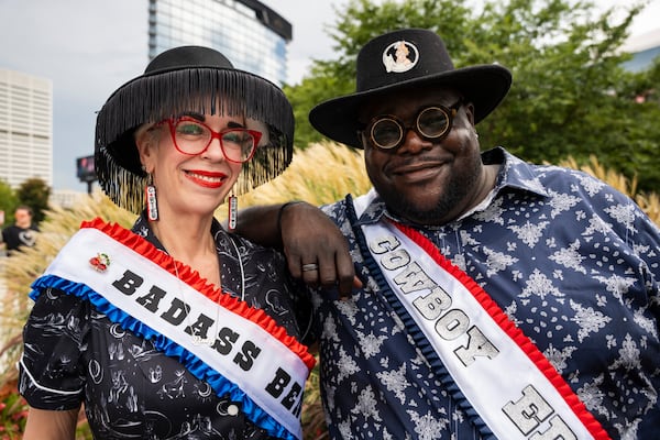 Lindsay Bennett and Brian Edgecomb pose in line together at Beyonce's Cowboy Carter concert in Atlanta on Thursday, July 10, 2025. (Olivia Bowdoin for the AJC). 