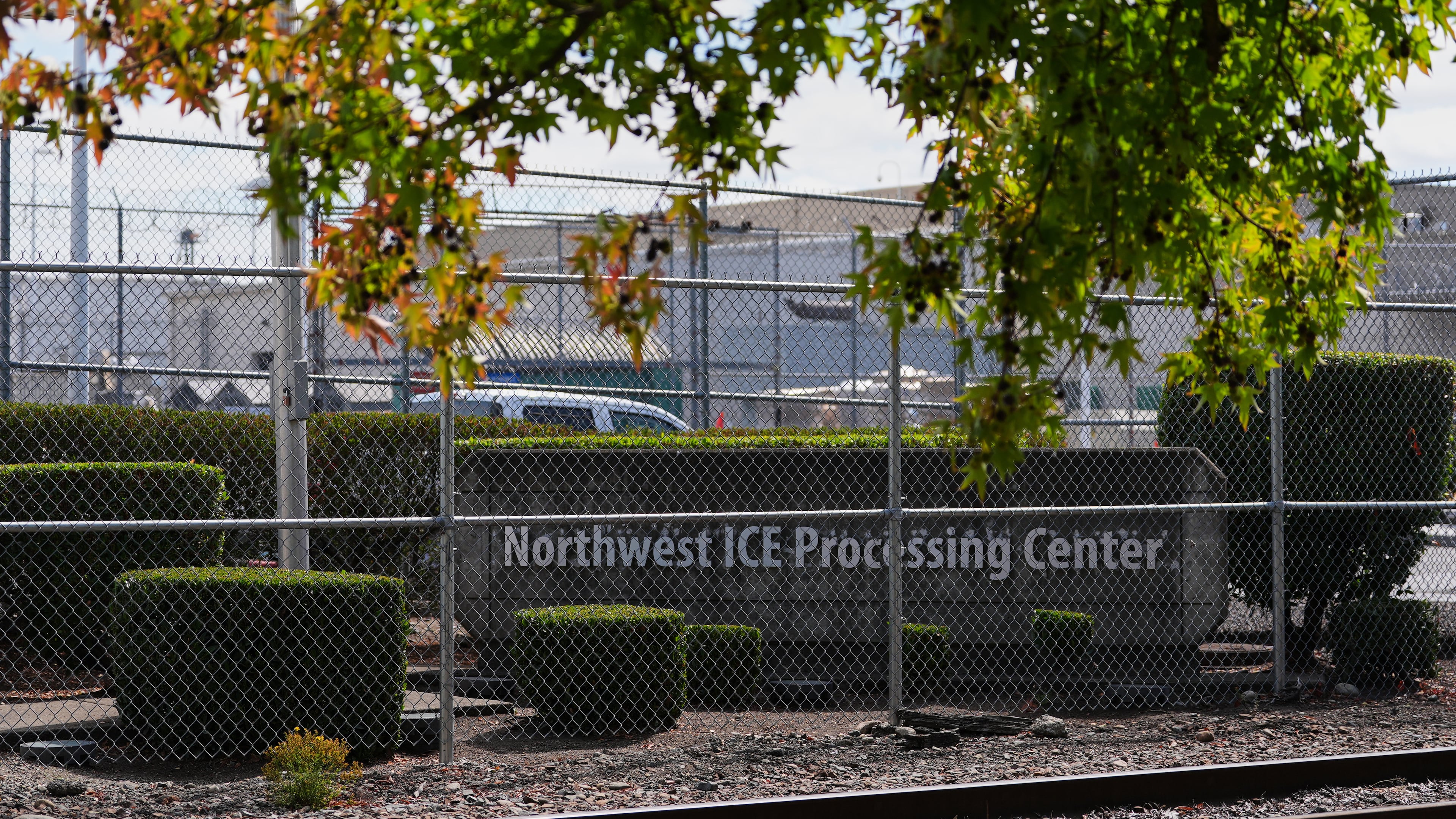 The entrance to the Northwest U.S. Immigration and Customs Enforcement Processing Center is seen, Aug. 13, 2025, in Tacoma, Wash. (AP Photo/Lindsey Wasson)