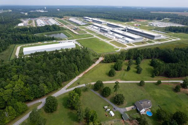 Jeff and Beverly Morris' home and property, seen at bottom on July 29, is now directly across the street from a Meta data center. (Ben Gray for the AJC)