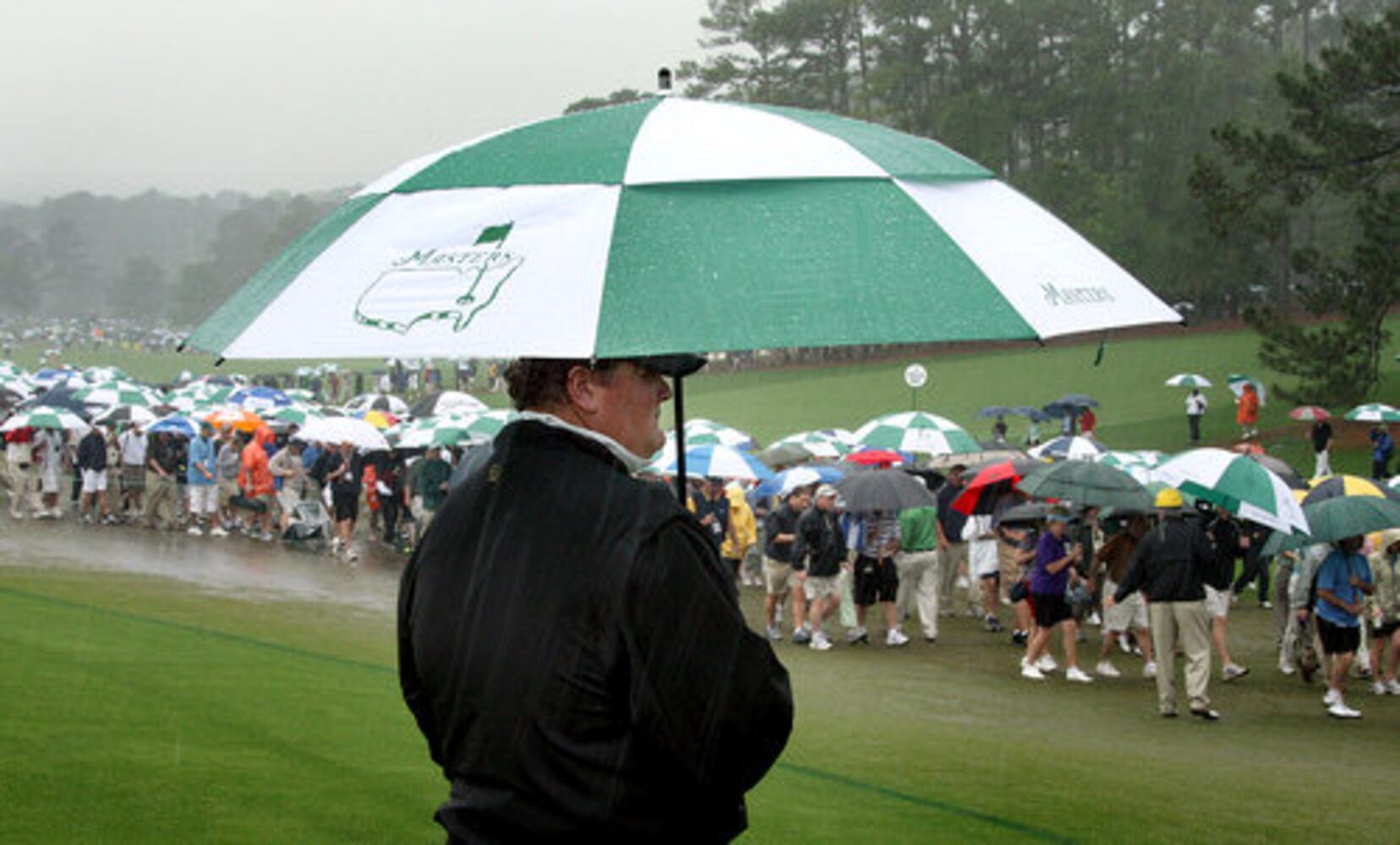 Umbrellas fill Augusta National