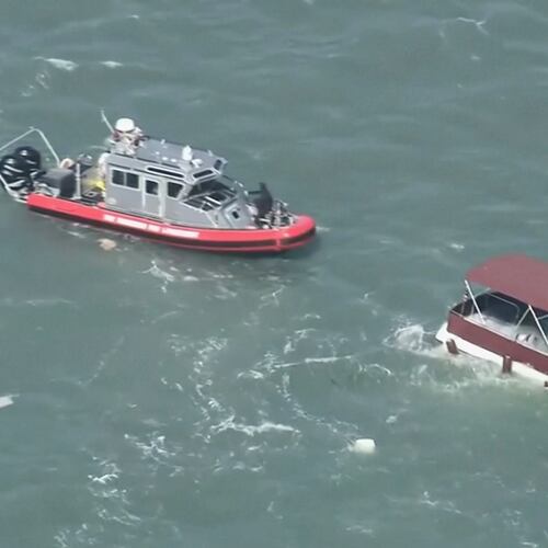 This image made from video provided by KGO-TV shows first responders reacting to a sinking boat Tuesday, July 14, 2026, in the waters off of San Francisco. (KGO via AP)