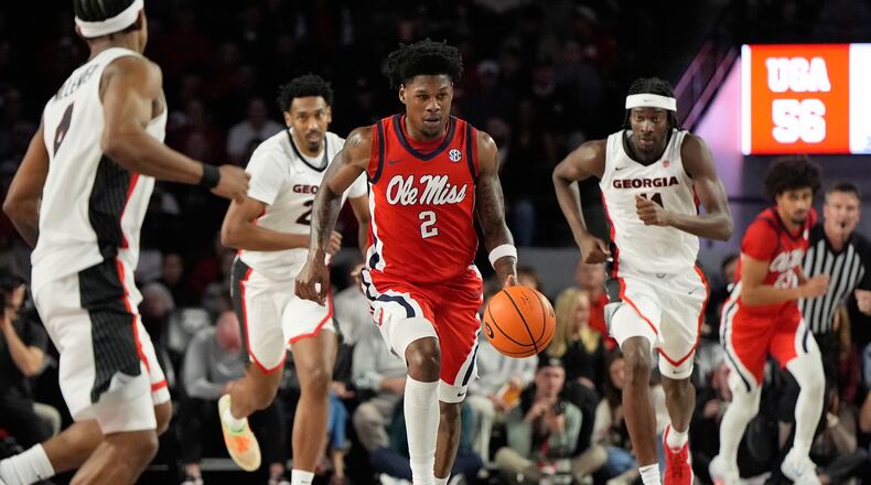 Mississippi guard AJ Storr dribbles the ball during an NCAA college basketball game against Georgia, Wednesday, Jan. 14, 2026, in Athens, Ga. Georgia lost in overtime in spite of a late lead, an issue that arose in 2025 and has continued to crop up in 2026. (Brynn Anderson/AP)