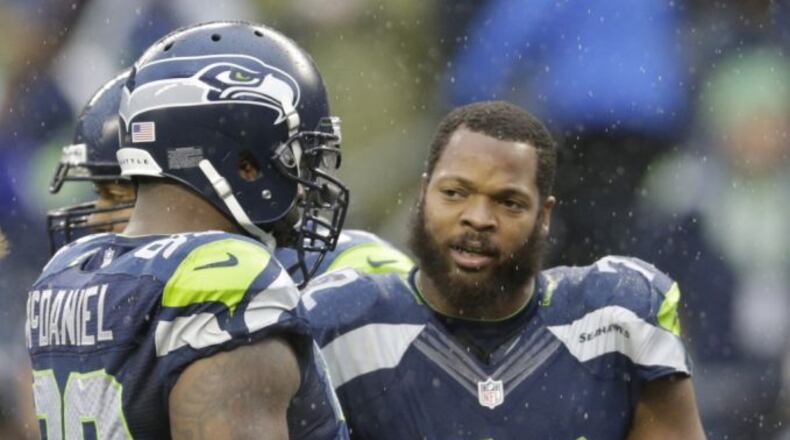 Michael Bennett (72) reportedly wants to be traded to the Atlanta Falcons to be reunited with head coach Dan Quinn. (Scott Eklund/Associated Press)