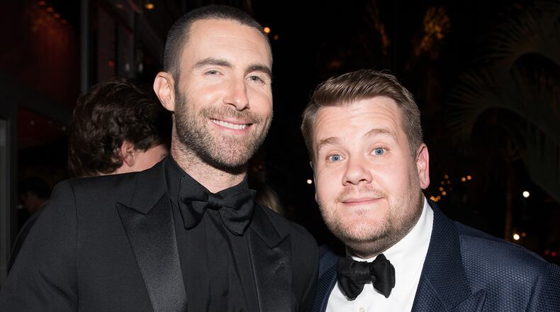 Adam Levine (L) and James Corden were pulled over by a police officer during an episode of "Carpool Karaoke."  (Photo by Emma McIntyre/VF18/WireImage)