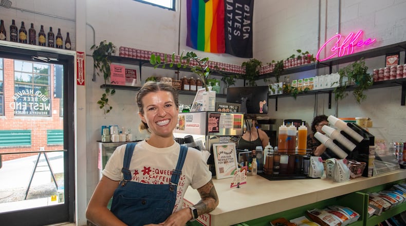 Kayla Bellman poses at her coffee stand Finca to Filter inside Wild Heaven West End Brewery on July 27, 2023. (Jenni Girtman for The Atlanta Journal Constitution)