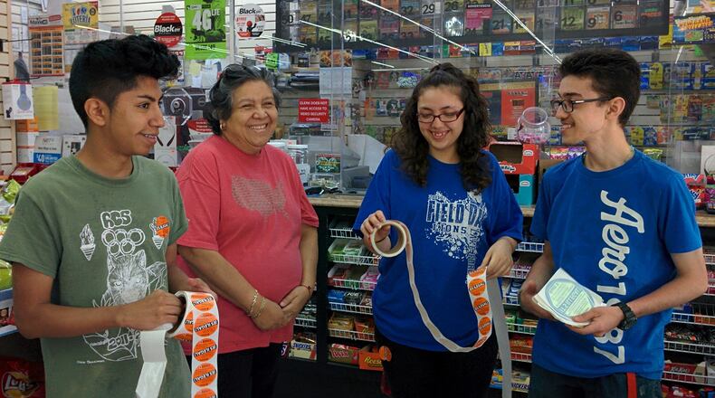 Youths gather for the "Sticker Shock" alcohol prevention campaign.