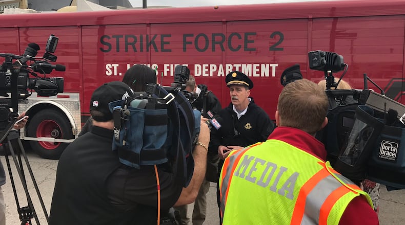 Authorities in St. Louis address the media after an explosion was reported at a building on Russell Boulevard on Monday, April 3, 2017.