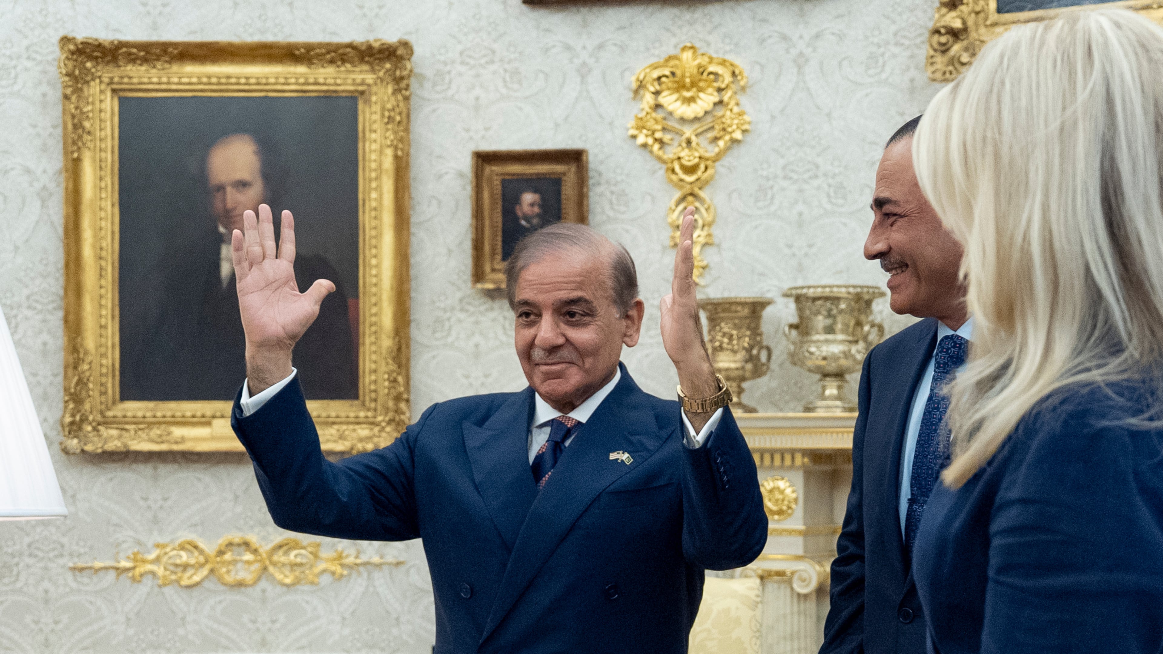 Pakistan Prime Minister Muhammad Shehbaz Sharif, left, and Gen. Syed Asim Munir wait for their meeting with President Donald Trump, in the Oval Office at the White House, Thursday, Sept. 25, 2025, in Washington. (AP Photo/Alex Brandon)