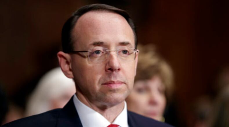 FILE- In this March 7, 2017, file photo, then-Deputy Attorney General-designate Rod Rosenstein, listens on Capitol Hill in Washington, during his confirmation hearing before the Senate Judiciary Committee. The author of a scathing memo that the White House used to help justify the firing of FBI Director James Comey is also overseeing a Justice Department investigation into Russian interference in the 2016 election. In a three-page rebuke of Comey's conduct, Rosenstein said the FBI director had usurped the attorney general's authority last year when he announced that the FBI was closing its investigation of Hillary Clinton's use of a private email as secretary of state. (AP Photo/J. Scott Applewhite, File)