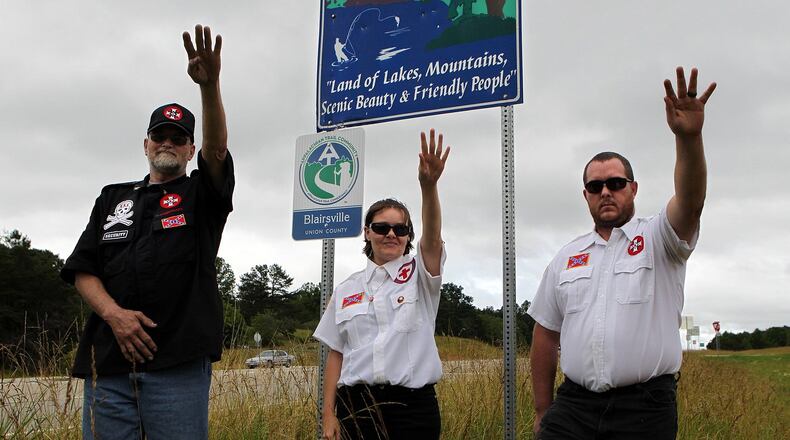 Members of the International Keystone Knights of the Ku Klux Klan on Ga. 515 in north Georgia where they want to pick up trash. State officials turned them down because they don't want to erect signs noting the Klan "adopted" that portion. AP Photo