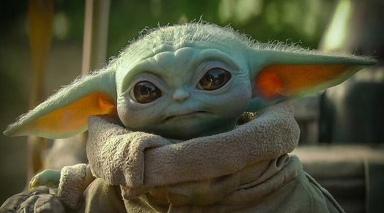 On Thursday, a larger-than-life helium-filled likeness of Grogu, the beloved “Mandalorian” character also known as Baby Yoda and the Child, is making its aerial debut above the streets of New York. (AJC file photo)