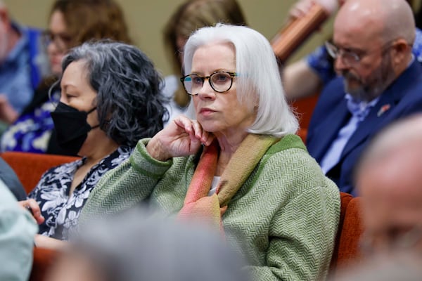 Marilyn Marks, executive director of the Coalition for Good Governance, listens to speakers during a State Election Board meeting at the Dawson County Government Center on Wednesday, April 15, 2026.  (Miguel Martinez/AJC)